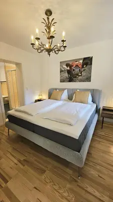 Ein Bett oder Betten in einem Zimmer der Unterkunft Almrose Zauber by Alpenchalet Almrose