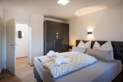 Ein Bett oder Betten in einem Zimmer der Unterkunft Ferienwohnungen Roko