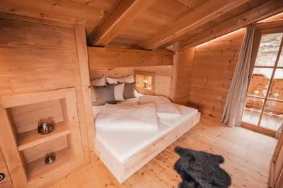 Ein Bett oder Betten in einem Zimmer der Unterkunft Buchegg Alm