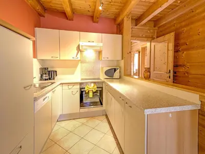 Küche/Küchenzeile in der Unterkunft Holiday Village Wildschönau Family Chalet