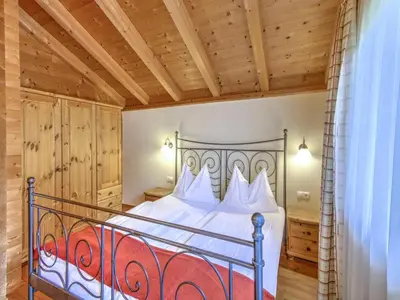 Ein Bett oder Betten in einem Zimmer der Unterkunft Scenic Stay in Feriendorf Wildschönau Chalet