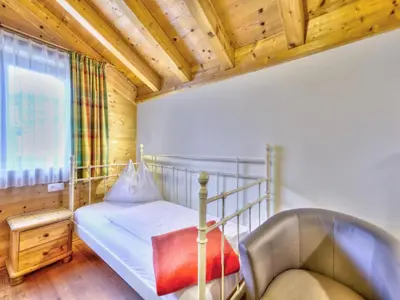 Ein Bett oder Betten in einem Zimmer der Unterkunft Feriendorf Wildschönau near sauna