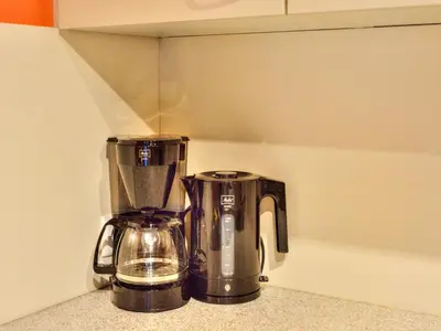 Kaffee-/Teezubehör in der Unterkunft Feriendorf Wildschönau with private garden
