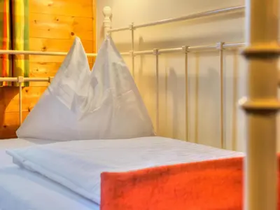 Ein Bett oder Betten in einem Zimmer der Unterkunft Feriendorf Wildschönau with private garden