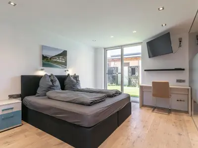 Ein Bett oder Betten in einem Zimmer der Unterkunft Alpin Chalet ARTE