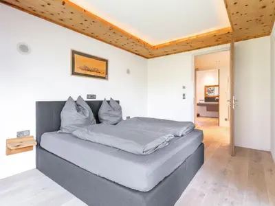 Ein Bett oder Betten in einem Zimmer der Unterkunft Alpin Chalet ARTE