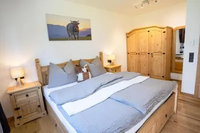 Ein Bett oder Betten in einem Zimmer der Unterkunft Bichler's Alpennest