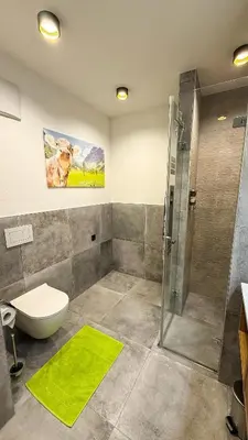 Ein Badezimmer in der Unterkunft Bichler's Alpennest