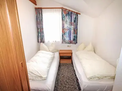 Ein Bett oder Betten in einem Zimmer der Unterkunft Apartment Voithofer-2 by Interhome
