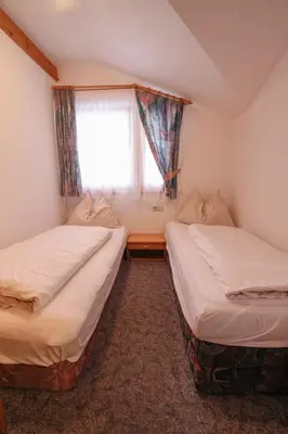 Ein Bett oder Betten in einem Zimmer der Unterkunft Apartment Voithofer-2 by Interhome