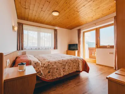 Ein Bett oder Betten in einem Zimmer der Unterkunft Apartment Voithofer-3 by Interhome