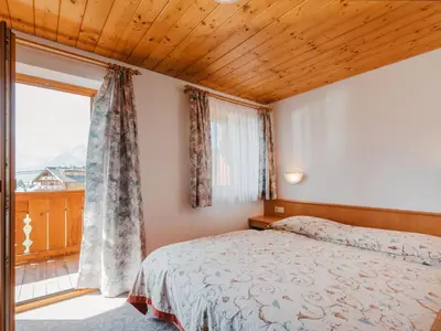Ein Bett oder Betten in einem Zimmer der Unterkunft Apartment Voithofer-6 by Interhome