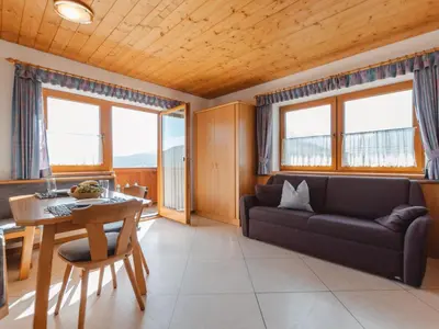 Ein Sitzbereich in der Unterkunft Apartment Voithofer-6 by Interhome