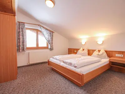 Ein Bett oder Betten in einem Zimmer der Unterkunft Apartment Voithofer-5 by Interhome
