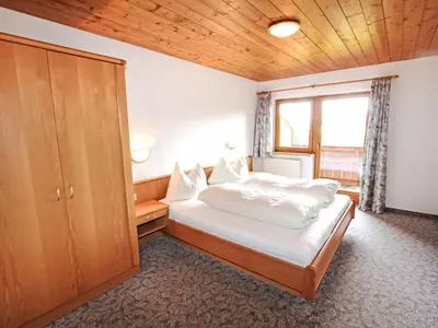 Ein Bett oder Betten in einem Zimmer der Unterkunft Apartment Voithofer-5 by Interhome