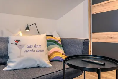 Ein Bett oder Betten in einem Zimmer der Unterkunft Zimmermanns - Alpine Living