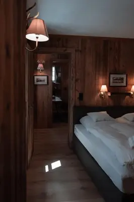 Ein Bett oder Betten in einem Zimmer der Unterkunft Löw Chalet Suite 1 in the Heart of Kitzbühel by 360 Estates