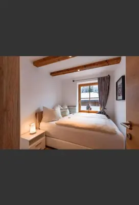 Ein Bett oder Betten in einem Zimmer der Unterkunft Haus Huber Sonnenhofweg