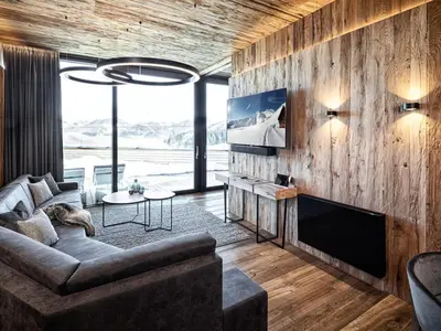 Ein Sitzbereich in der Unterkunft Mountain View Loft Bergkristall