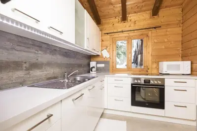 Küche/Küchenzeile in der Unterkunft Alpen-Chalets Achensee