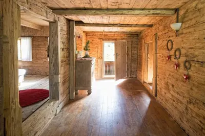 Ein Bett oder Betten in einem Zimmer der Unterkunft Bergchalet Heidialm
