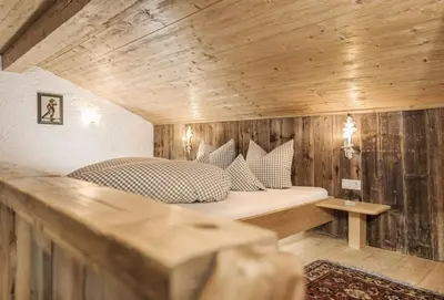 Ein Bett oder Betten in einem Zimmer der Unterkunft Bergchalet Klausner Edelweiß