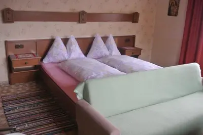 Ein Bett oder Betten in einem Zimmer der Unterkunft Bauernhaus Hollersbach