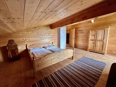Ein Bett oder Betten in einem Zimmer der Unterkunft Lockner Hütte