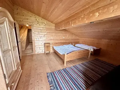 Ein Bett oder Betten in einem Zimmer der Unterkunft Lockner Hütte