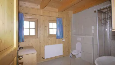 Ein Badezimmer in der Unterkunft Kogelalm