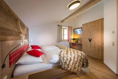 Ein Bett oder Betten in einem Zimmer der Unterkunft Bachgut Jagdhaus Chalet