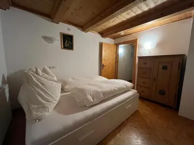 Ein Bett oder Betten in einem Zimmer der Unterkunft Wöscherhof