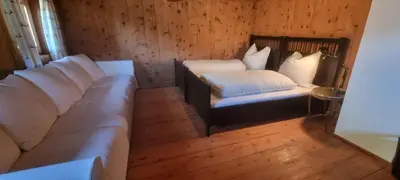Ein Bett oder Betten in einem Zimmer der Unterkunft Wöscherhof