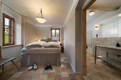 Ein Bett oder Betten in einem Zimmer der Unterkunft Das Krämerhaus by Alpine Host Helpers