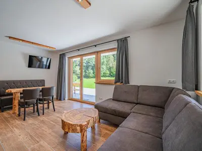 Ein Sitzbereich in der Unterkunft Haus Bergstille Top 1 - 2