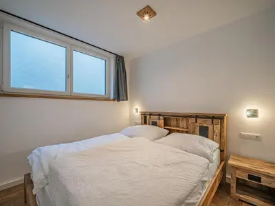 Ein Bett oder Betten in einem Zimmer der Unterkunft Haus Bergstille Top 1 - 2