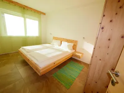 Ein Bett oder Betten in einem Zimmer der Unterkunft Haus am Sonnenhang