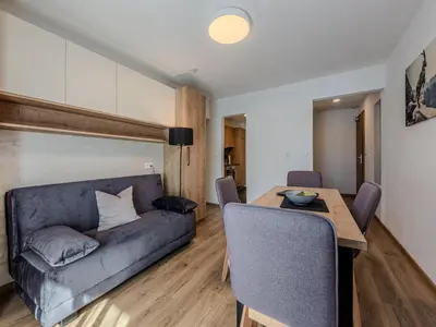 Ein Sitzbereich in der Unterkunft Apartment in the center of Jochberg