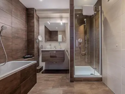 Ein Badezimmer in der Unterkunft Modern apartment in Jochberg with terrace