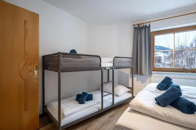 Ein Bett oder Betten in einem Zimmer der Unterkunft Residenz am Sonnenhang Wildschönau