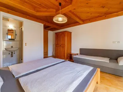 Ein Bett oder Betten in einem Zimmer der Unterkunft Grünbichel Hof I