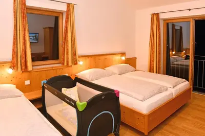 Ein Bett oder Betten in einem Zimmer der Unterkunft Appartements neben der Gondelbahn - Haus Nord