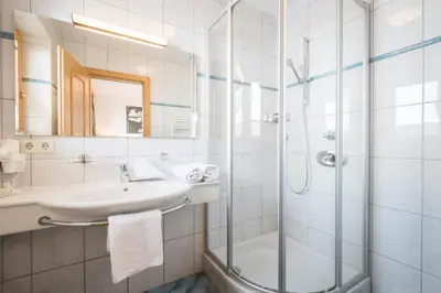 Ein Badezimmer in der Unterkunft Alpenkönig