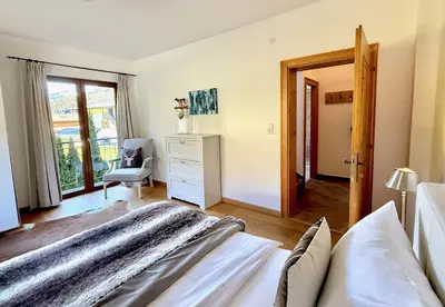 Ein Bett oder Betten in einem Zimmer der Unterkunft KITZHORN EMOTIONS near skilift by Belle-Stay