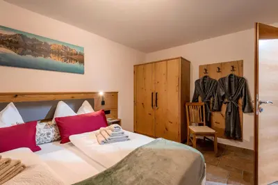 Ein Bett oder Betten in einem Zimmer der Unterkunft Kaiserapart Karin