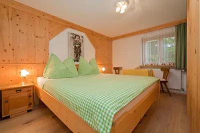 Ein Bett oder Betten in einem Zimmer der Unterkunft Haus Waldrand