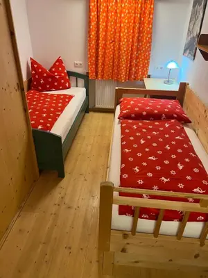 Ein Bett oder Betten in einem Zimmer der Unterkunft Haus Waldrand