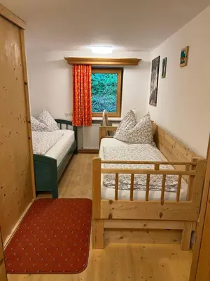Ein Bett oder Betten in einem Zimmer der Unterkunft Haus Waldrand