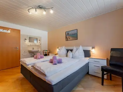 Ein Bett oder Betten in einem Zimmer der Unterkunft Sonnenschein I