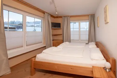 Ein Bett oder Betten in einem Zimmer der Unterkunft Haus 129 Top 2